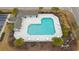 Aerial view of the community pool area with tables and chairs at 1442 Chanson Ct., Little River, SC 29566