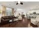 Open-concept living area blending seamlessly into the kitchen, featuring hardwood floors and lots of seating at 1442 Chanson Ct., Little River, SC 29566