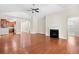 Open-concept living room with a fireplace and view into the kitchen at 1537 Beaumont Way, Myrtle Beach, SC 29577