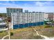 Exterior view of condo building, featuring spacious balconies, beach access, and onsite parking at 1709 S Ocean Blvd. # 411, North Myrtle Beach, SC 29582