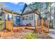 Exterior features a wood deck leading to home with blue trim at 1800 Glenns Bay Rd., Surfside Beach, SC 29575