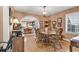 Warm dining room with hardwood floors, an arched doorway, and a large table for entertaining at 1800 Glenns Bay Rd., Surfside Beach, SC 29575