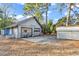 The large, detached garage with two bays and an additional storage shed at 1800 Glenns Bay Rd., Surfside Beach, SC 29575