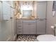 Stylish bathroom with gray vanity, granite countertop, and glass-enclosed shower at 2001 S Ocean Blvd. # 405, Myrtle Beach, SC 29577