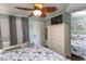 Bedroom features a large closet and beach themed decor at 2001 S Ocean Blvd. # 405, Myrtle Beach, SC 29577