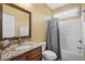 Cozy bathroom features granite vanity top and tub with shower at 202 Cypress Knee Ct., Conway, SC 29526