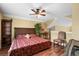 Comfortable bedroom with unique ceiling and warm inviting tones at 202 Cypress Knee Ct., Conway, SC 29526