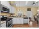 Kitchen with stainless steel appliances, granite countertops, and eat-in breakfast bar at 202 Cypress Knee Ct., Conway, SC 29526