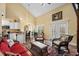 Cozy living area seamlessly blending into the kitchen, complete with charming wicker seating at 202 Cypress Knee Ct., Conway, SC 29526