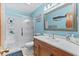 Bathroom featuring a wood vanity and a glass shower at 202 Old Harbour Ct., Little River, SC 29566