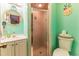 Bright bathroom with modern fixtures and mint green walls at 202 Old Harbour Ct., Little River, SC 29566