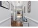 Welcoming foyer with wood flooring, neutral walls, and stylish decorative accents at 2051 Lindrick Ct., Calabash, NC 28467