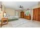 Inviting bedroom showcasing soft carpet, wood furnishings, ceiling fan, and great natural light at 2270 Vereen Circle, Little River, SC 29566