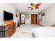 Spacious main bedroom featuring neutral walls, ceiling fan, and a dresser with lots of storage space at 2270 Vereen Circle, Little River, SC 29566