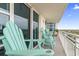 Balcony with Adirondack chairs and stunning ocean views at 2301 S Ocean Blvd. # 1401, North Myrtle Beach, SC 29582
