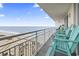Spacious balcony features comfortable Adirondack chairs with stunning ocean views at 2301 S Ocean Blvd. # 1401, North Myrtle Beach, SC 29582