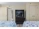 Shared bedroom featuring two beds, with a dresser and a TV in the middle at 2301 S Ocean Blvd. # 1401, North Myrtle Beach, SC 29582