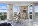 Sunny dining area with large windows and balcony access at 2301 S Ocean Blvd. # 1401, North Myrtle Beach, SC 29582