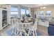 Comfortable dining area with seating for six and balcony access at 2301 S Ocean Blvd. # 1401, North Myrtle Beach, SC 29582