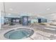 Indoor pool and hot tub area featuring unique architectural details and blue and white color scheme at 2301 S Ocean Blvd. # 1401, North Myrtle Beach, SC 29582