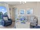 Living room features comfortable seating and bright coastal decor at 2301 S Ocean Blvd. # 1401, North Myrtle Beach, SC 29582