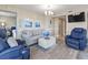 Comfortable living room with a coastal theme and lots of seating at 2301 S Ocean Blvd. # 1401, North Myrtle Beach, SC 29582