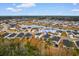 Aerial view of community featuring homes around a pond including 242 Timber Oaks Drive at 242 Timber Oaks Dr., Myrtle Beach, SC 29588