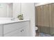 Well lit bathroom featuring a large white vanity and stylish decor at 242 Timber Oaks Dr., Myrtle Beach, SC 29588