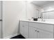 Bright bathroom featuring a double vanity with white cabinets and modern fixtures, offering style and convenience at 242 Timber Oaks Dr., Myrtle Beach, SC 29588