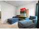 Spacious bedroom with versatile seating and storage options, perfect for relaxation or organization at 242 Timber Oaks Dr., Myrtle Beach, SC 29588