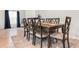 Elegant dining room features a large wooden table with seating for eight at 242 Timber Oaks Dr., Myrtle Beach, SC 29588