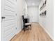 Bright foyer featuring wood floors, a charming chair, and decorative accents at 242 Timber Oaks Dr., Myrtle Beach, SC 29588