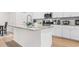 Bright kitchen with granite countertops, white cabinets, stainless steel appliances and a center island at 242 Timber Oaks Dr., Myrtle Beach, SC 29588