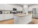 Modern kitchen featuring an island with granite countertop and stainless steel appliances in an open-concept layout at 242 Timber Oaks Dr., Myrtle Beach, SC 29588