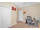 Bedroom with a ceiling fan and a chair and a desk, and closet doors at 256 Maple Oak Dr., Conway, SC 29526