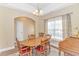 Dining space featuring a wood table, chairs, and large window, providing ample natural light at 256 Maple Oak Dr., Conway, SC 29526