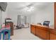 Spacious bedroom showcasing a classic wooden desk, chair, and ample natural light at 287 Kanawha Trail, Longs, SC 29568