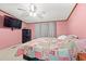 Cozy bedroom featuring a flat-screen TV and a secure gun safe at 287 Kanawha Trail, Longs, SC 29568