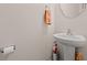 Clean powder room with a pedestal sink, a decorative mirror and wall-mounted towel rack at 3000 Chesterwood Ct., Myrtle Beach, SC 29579