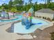 A vibrant water park with colorful slides, interactive water features, and a lazy river for endless fun at 3000 Chesterwood Ct., Myrtle Beach, SC 29579