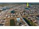 An aerial view of the community featuring scenic ponds, lush landscaping, mature trees, a pool, and open green spaces at 302 Camrose Way, Myrtle Beach, SC 29588