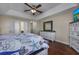 Spacious bedroom with hard wood floors, a dresser, and decorative accents at 302 Camrose Way, Myrtle Beach, SC 29588