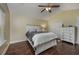 Comfortable bedroom with a large bed, ceiling fan, and ample storage space at 302 Camrose Way, Myrtle Beach, SC 29588