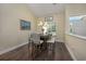 Cozy dining room featuring a chandelier, a window and comfortable seating at 302 Camrose Way, Myrtle Beach, SC 29588