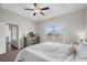 Cozy bedroom featuring a tray ceiling, plush carpet, and neutral paint, creating a relaxing atmosphere at 349 Lakota Loop, Longs, SC 29568