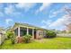 A screened-in porch overlooks the backyard at 3791 Cagney Ln., Myrtle Beach, SC 29577