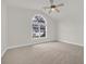 This bedroom has carpet flooring, and a window allowing natural light at 3791 Cagney Ln., Myrtle Beach, SC 29577