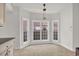 Bright breakfast nook featuring large bay windows at 3791 Cagney Ln., Myrtle Beach, SC 29577