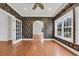 Living room with decorative wallpaper and hardwood flooring at 3791 Cagney Ln., Myrtle Beach, SC 29577