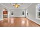 Large living room with hardwood floors and neutral paint at 3791 Cagney Ln., Myrtle Beach, SC 29577